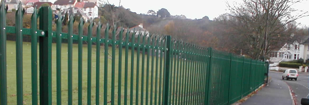 Green palisade fencing are installed to protect premises.